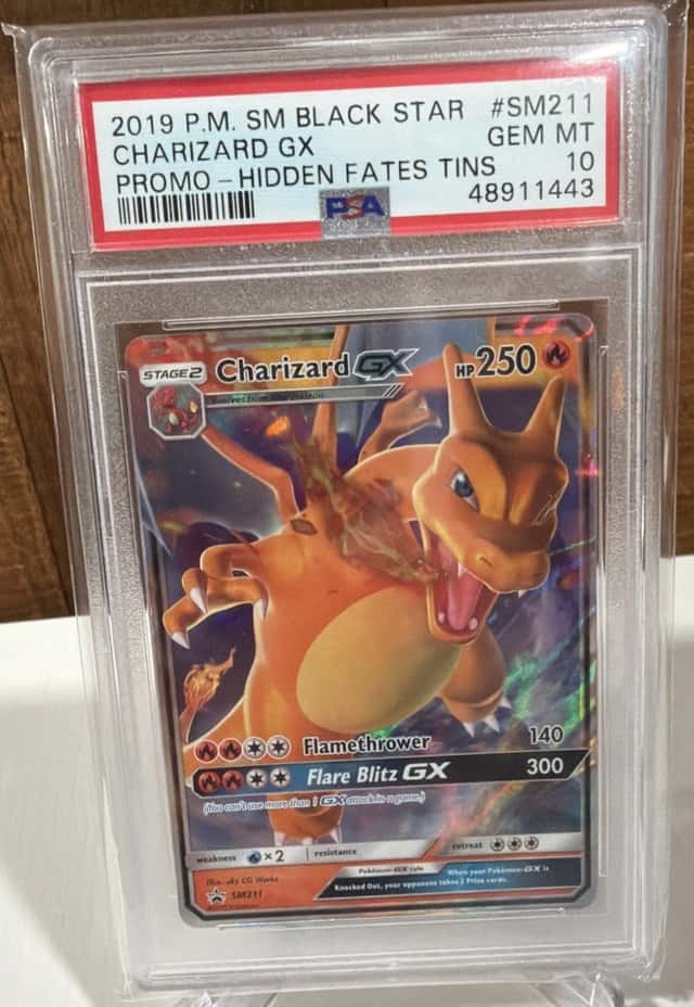 2019 POKEMON SM BLACK STAR PROMO HIDDEN FATES TINS #SM211 CHARIZARD GX PSA 10