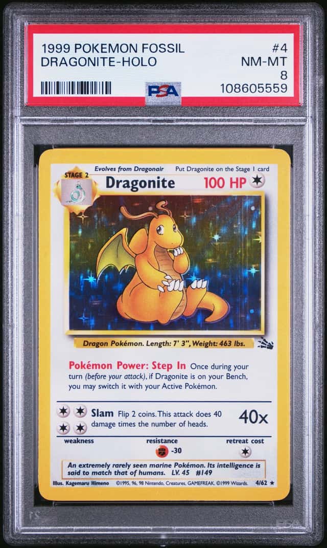 1999 Pokemon Fossil Dragonite Holo PSA 8