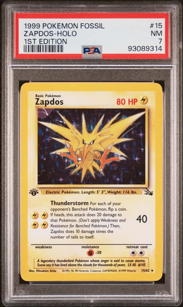 1999 Pokemon Fossil 1st Edition Holo #15 Zapdos - PSA NM 7