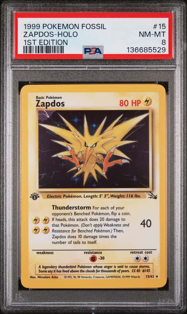 1999 POKEMON ZAPDOS-HOLO 1ST EDITION FOSSIL #15 PSA 8