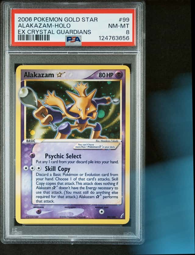 PSA 8 GOLD STAR ALAKAZAM 2006 POKEMON Vintage GOLD STAR #99 Fakuda