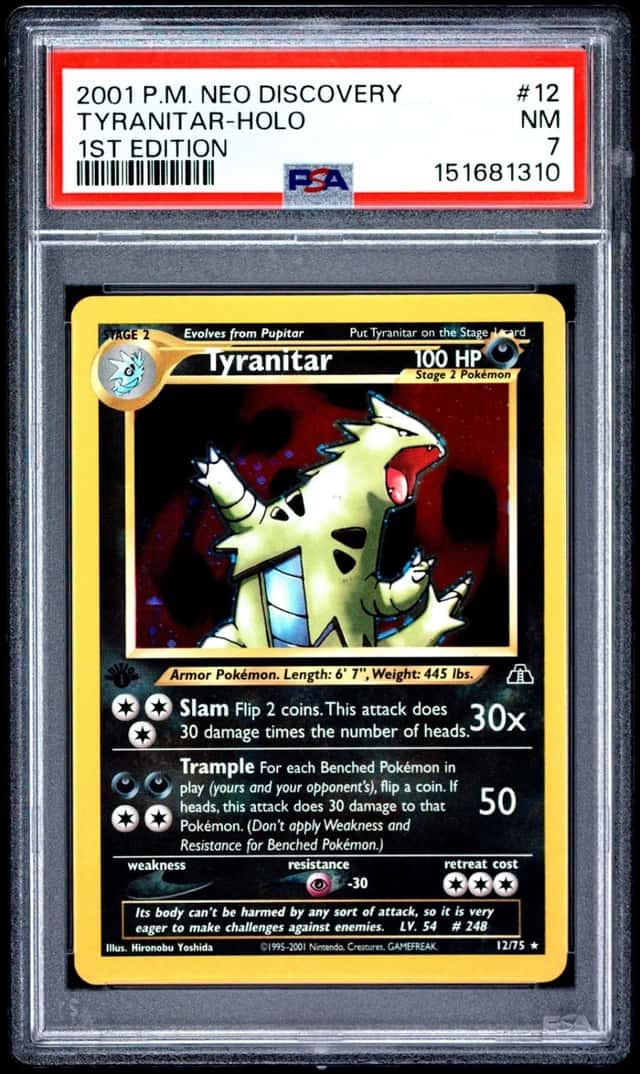 2001 POKEMON NEO DISCOVERY 1ST EDITION #12 TYRANITAR-HOLO PSA 7