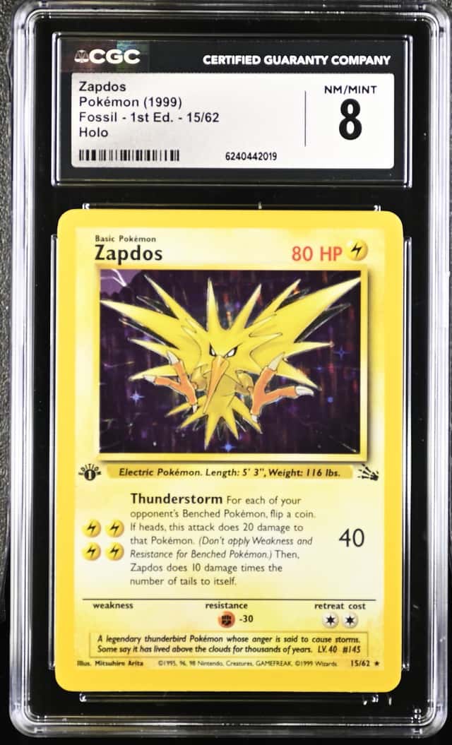 1999 Pokemon Fossil 1st Edition #15 Zapdos Holo CGC 8 NM-MT