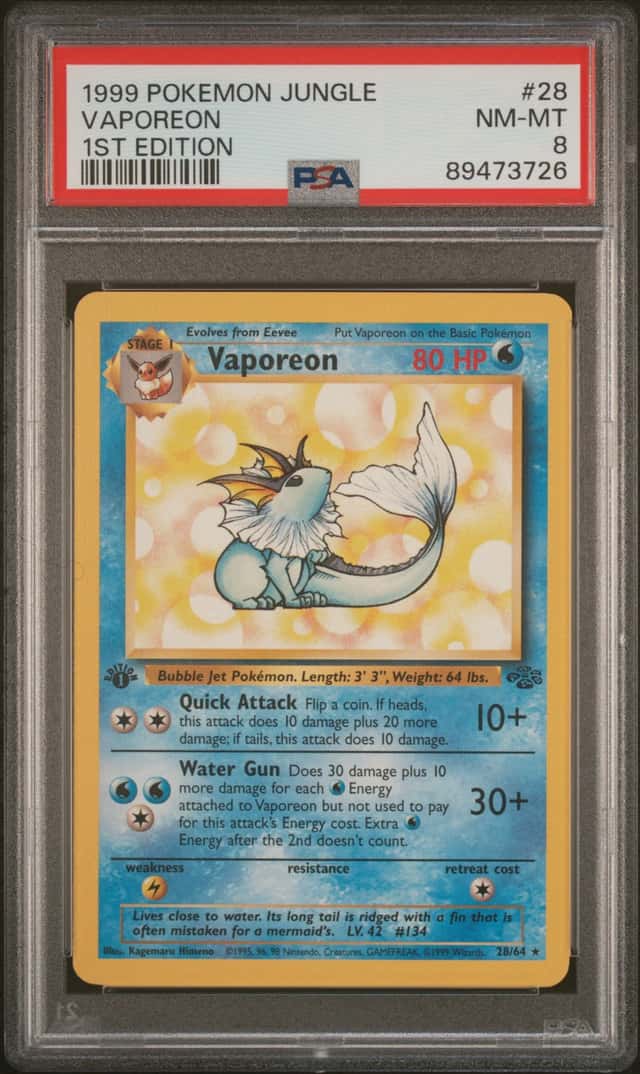 1999 POKEMON JUNGLE 1ST EDITION #28/64 VAPOREON PSA 8