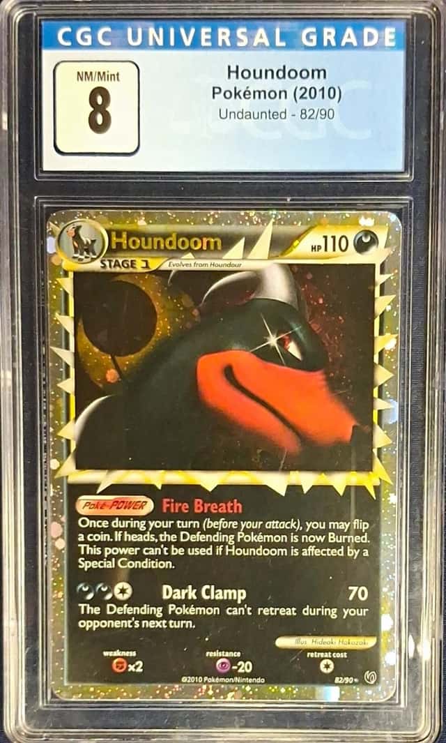 Pokemon TCG Houndoom Prime 82/90 Undaunted Holo Ultra Rare CGC 8