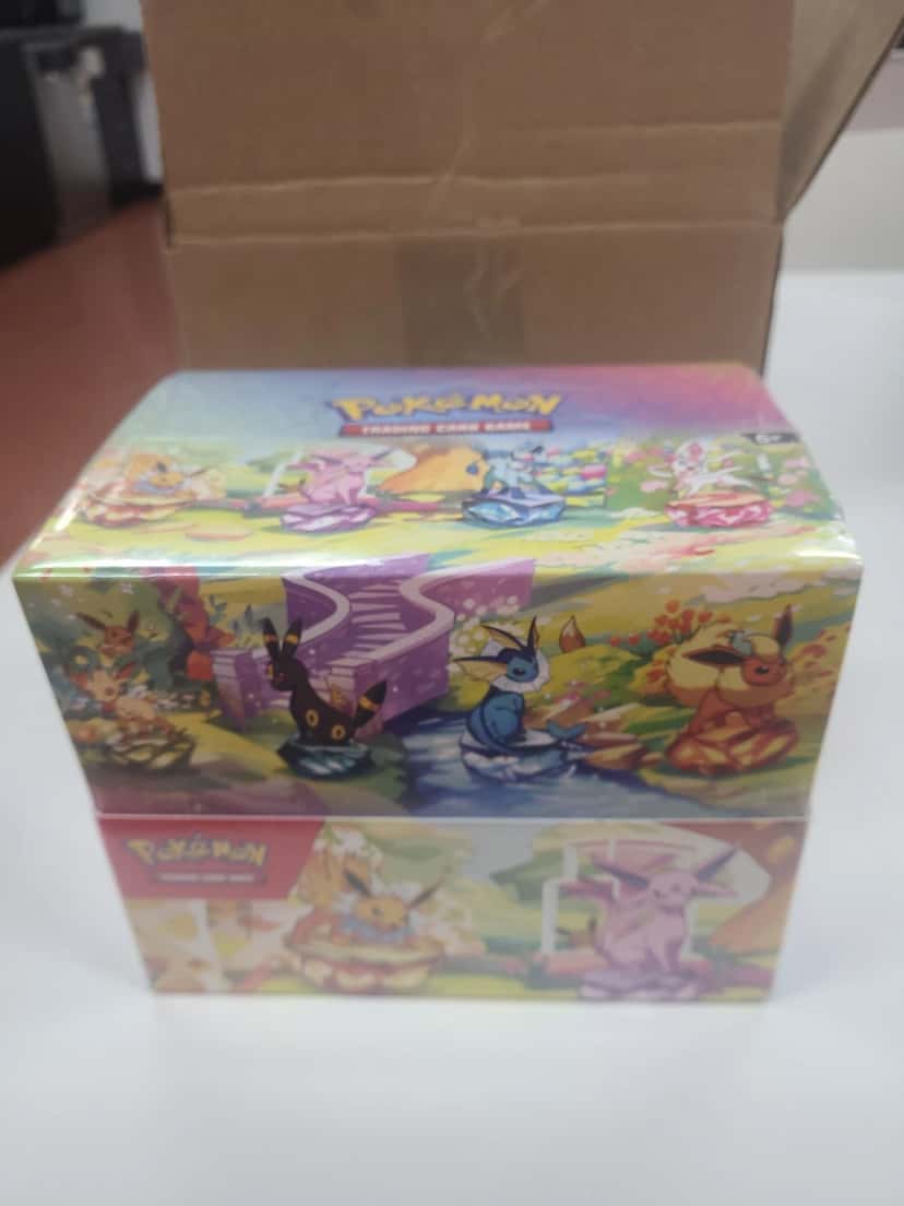 Prismatic Evolutions Mini Tin Display