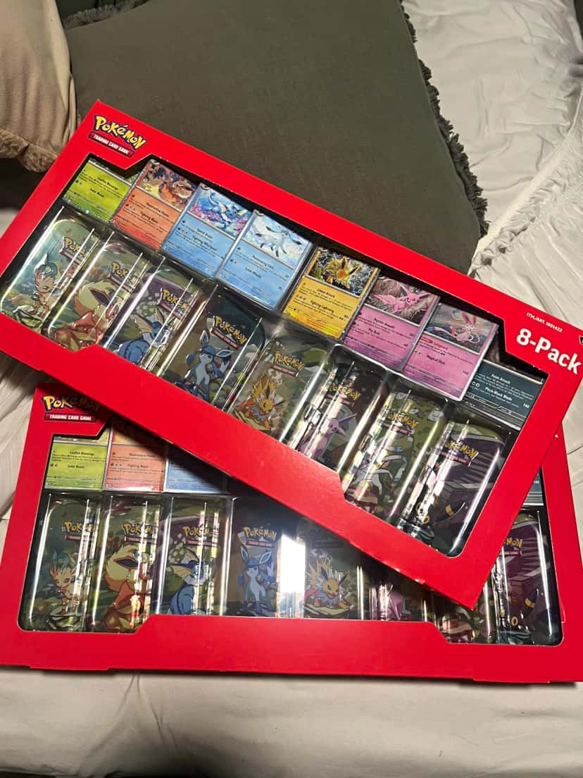Prismatic Evolutions Mini Tin 8 Pack Box