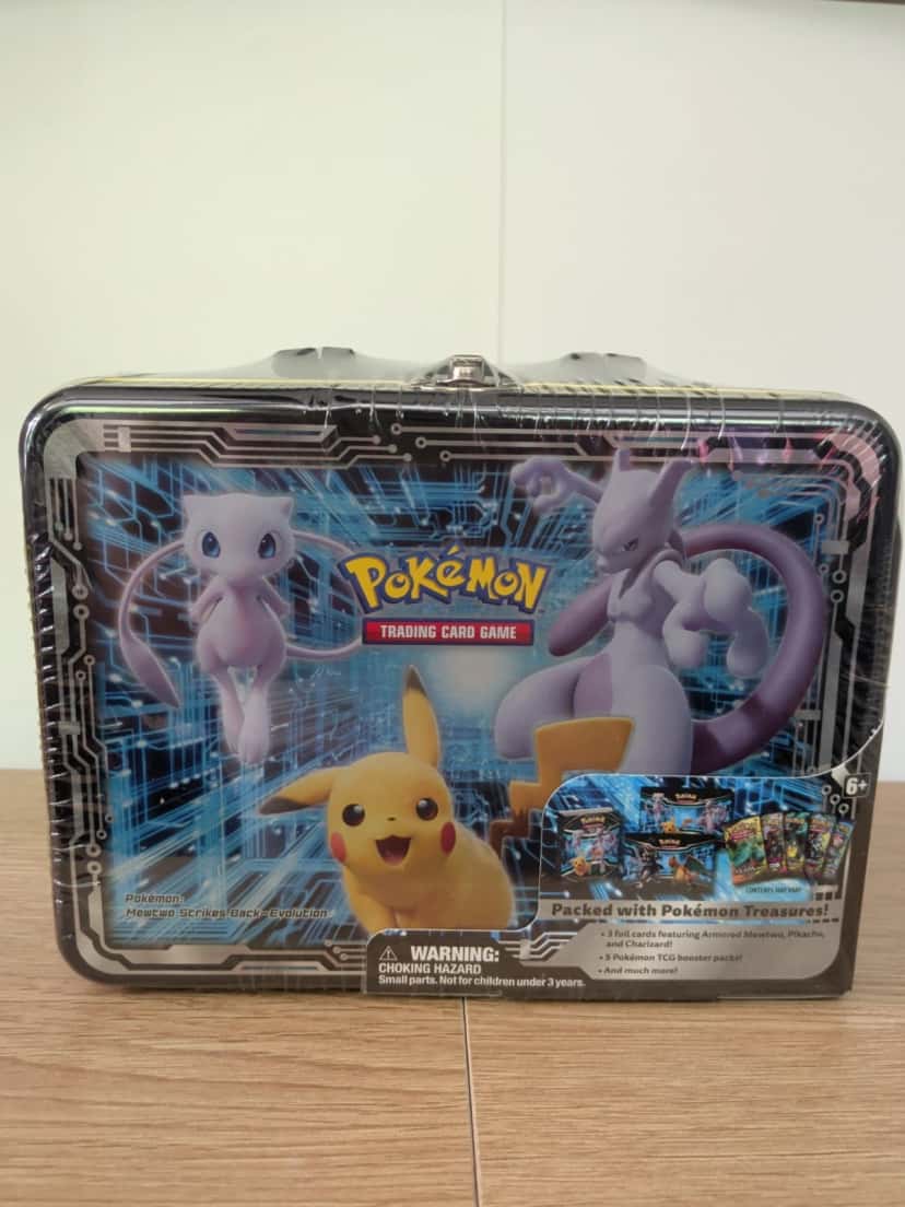 mewtwo strikes back evolution tin
